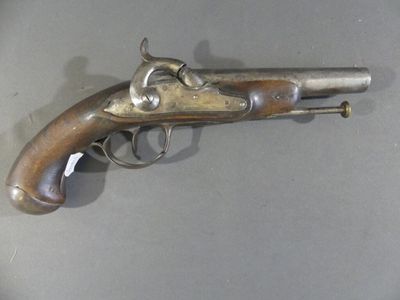 a gun that is on display on a table