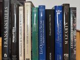 many books that are sitting on a shelf together
