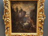 un vieux tableau accroché au mur d'une pièce, près d'un mur