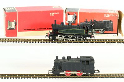 two different views of a model train on the tracks