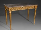 a gold and marble console table