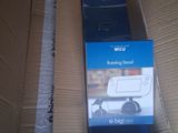 boxes of wii remotes are stacked on top of each other in a cardboard box