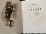 a book with a picture of a man in a suit
