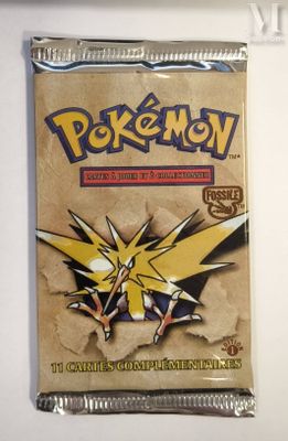 a close up of a bag of pokemon trading cards on a table