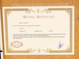 a picture of a certificate on a bulletin board