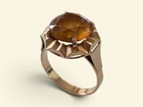 a close up of a ring with a stone on it