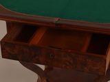 a table with a green cloth on top of it