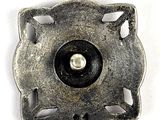 a metal object with a hole in the middle of it