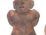 these are two figurines of a man and a woman on a white background