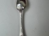 a spoon that is sitting on a table