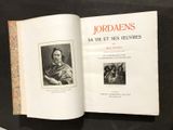un livre ouvert sur lequel figure l'image d'un homme et d'un chien