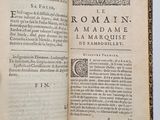 an open book on a white surface with a black border