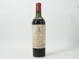 a bottle of wine that is sitting on a table