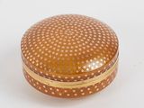 an image of a round box with stars on it on a white surface