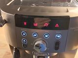 an image of a coffee machine on a wooden table