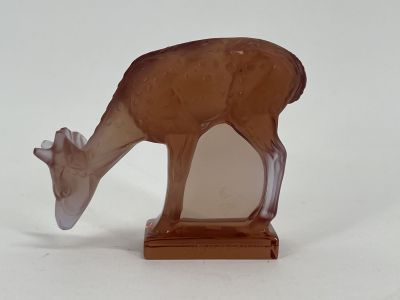 deer figurine on a white background with a white background