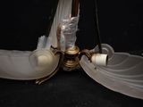 two lamps that are sitting next to each other on a table