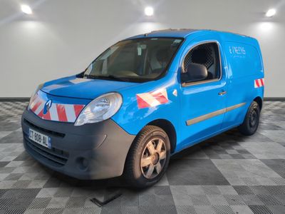 a picture of a blue van parked in a garage