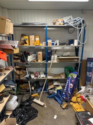 a room filled with lots of clutter and tools