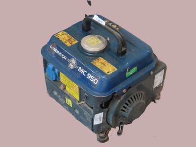 a small blue generator that is sitting on the ground