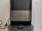 a black and silver machine sitting on top of a table