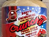 un pot de beurre de cacahuète posé sur une table