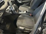 a picture of the inside of a car with the door open