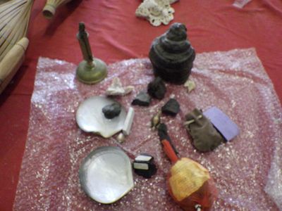 a red table cloth with various items on it