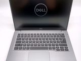the dell laptop is open and ready to be used