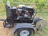 an image of a tractor with a trailer attached to it