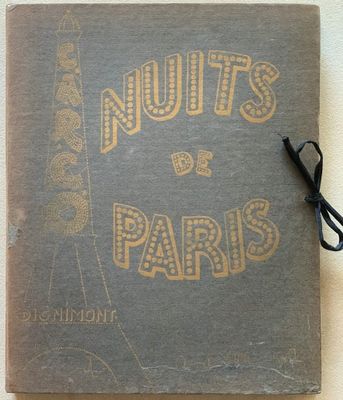 un vieux livre sur lequel sont inscrits les mots « nuts de paris »