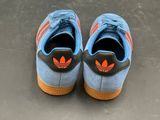 nike air force 1 ' s blue and orange sued with gum soles