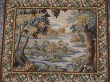 a picture of a tapestry hanging on the wall