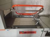 an image of a machine that is cutting a sheet of paper