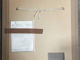 a picture of a picture of a piece of paper on the wall