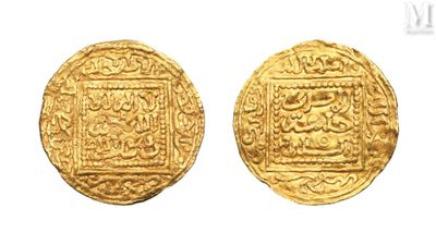 a gold coin with a design on the front and back of it