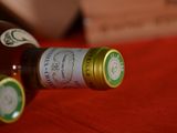 a bottle of wine that is sitting on a table