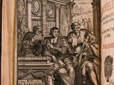 un vieux livre sur lequel figure l'image d'un homme assis sur un banc