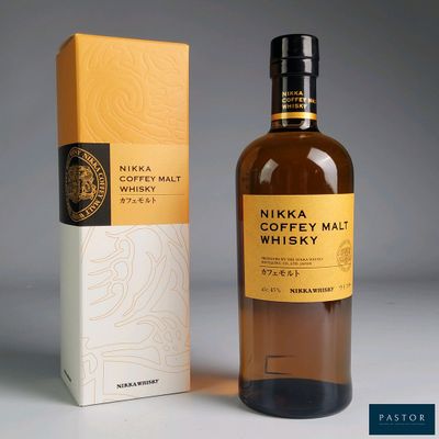 a bottle of nikka coffey mal whisky next to a box