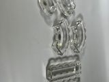 a close up of a bunch of glass objects on a table