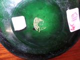 a green bowl with a picture of a cat on it