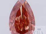 un losange orange dont la face a la forme d'une larme, sur fond blanc