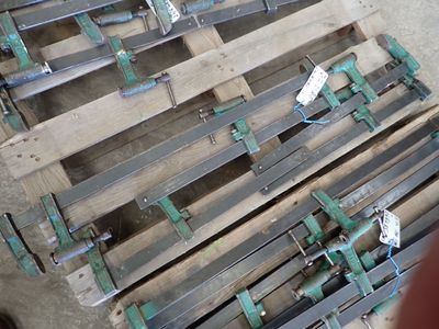 a pile of wooden pallets sitting on the ground