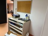 an image of a desk with a lot of papers on it