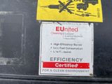a sticker on the back of a car that has a warning sign on it