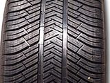 a close up of a tire on a white background