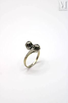 a close up of a silver ring with a skull on it
