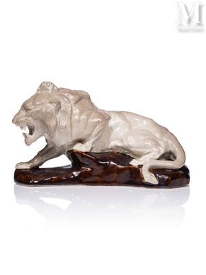 statue of a lion on a log on a white background