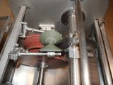 a picture of a machine that has a bucket in it