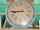 a clock that is sitting on top of a table